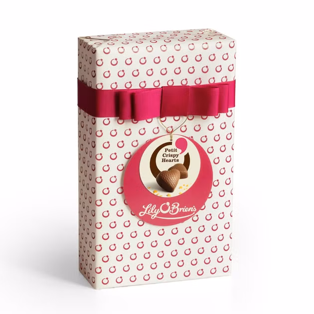 Milk Chocolate Hearts by Lily O'Brien's Irish Chocolatier. Honeycomb Crispy Hearts, 24 chocolates 220g wrapped in stylish cream and pink gift wrap and finished with the beautiful pink bow.